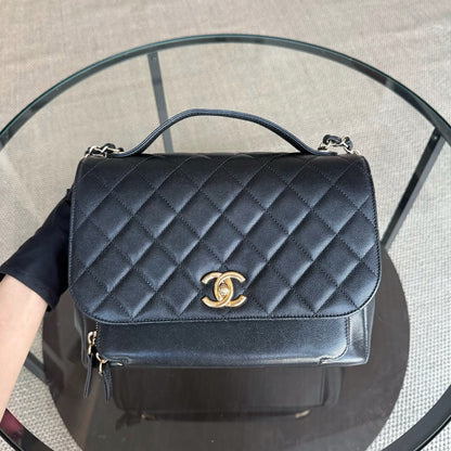 Sac Chanel Business Affinity grand format - 27 cm, cuir caviar matelassé noir, finitions dorées Series 23