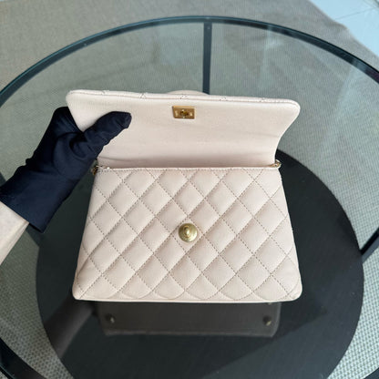 Sac Chanel Coco Handle petit modèle - Beige matelassé caviar, finitions dorées Series 24